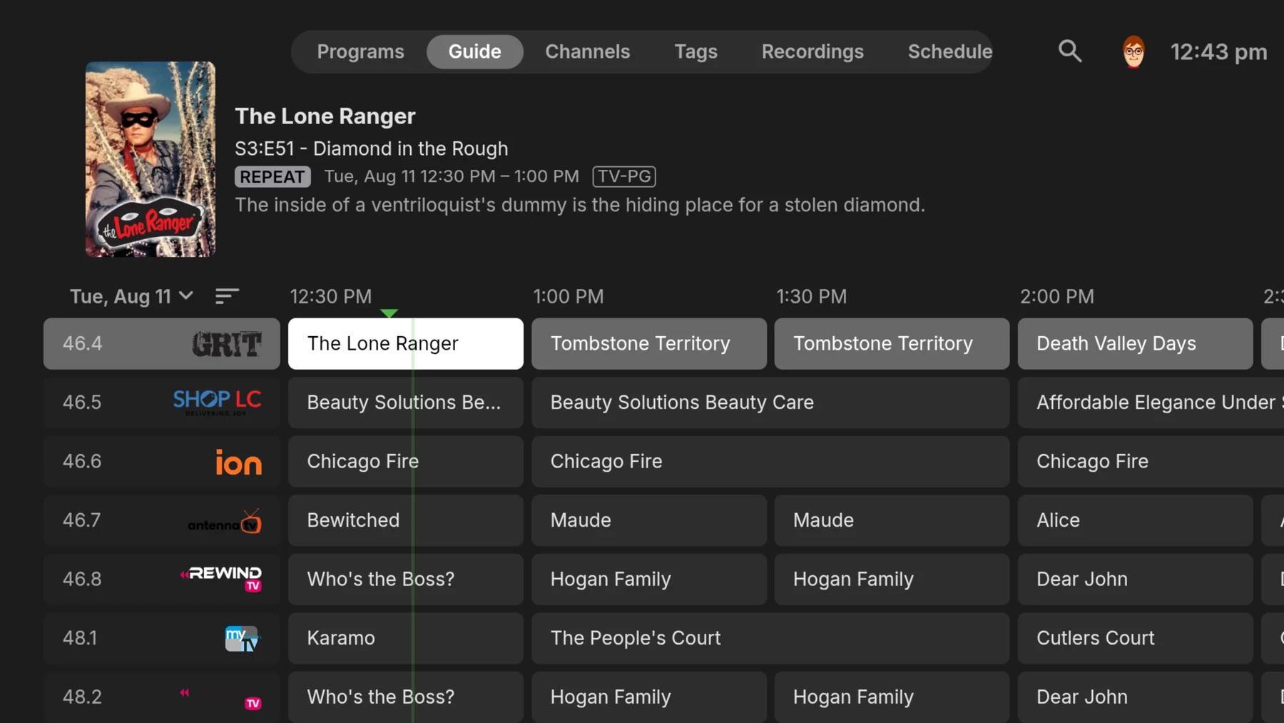 Emby Live TV guide displayed on a television